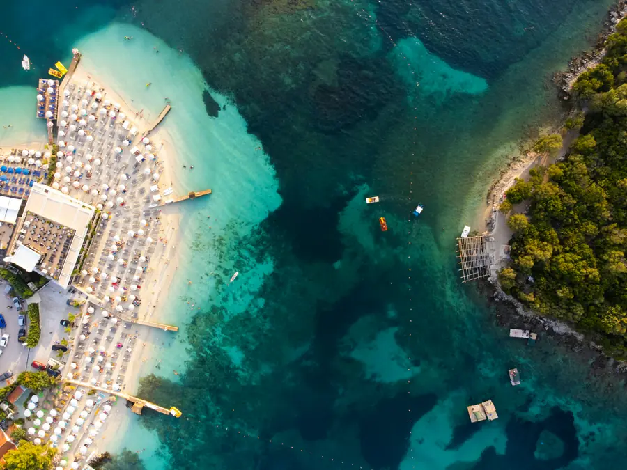 Aerial view of the Ionian coast at Ksamil, with small islands and a turquoise bay